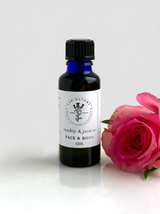 A bottle of rosehip and jasmine face and body oil moisturiser.