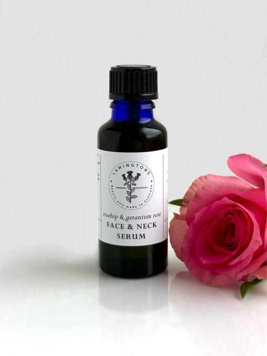 A bottle of rosehip and geranium rose face and neck serum moisturiser.