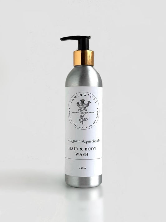 A bottle of petitgrain and patchouli hair and body wash