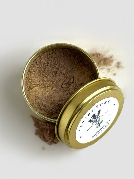 A jar of rhassoul clay face mask.