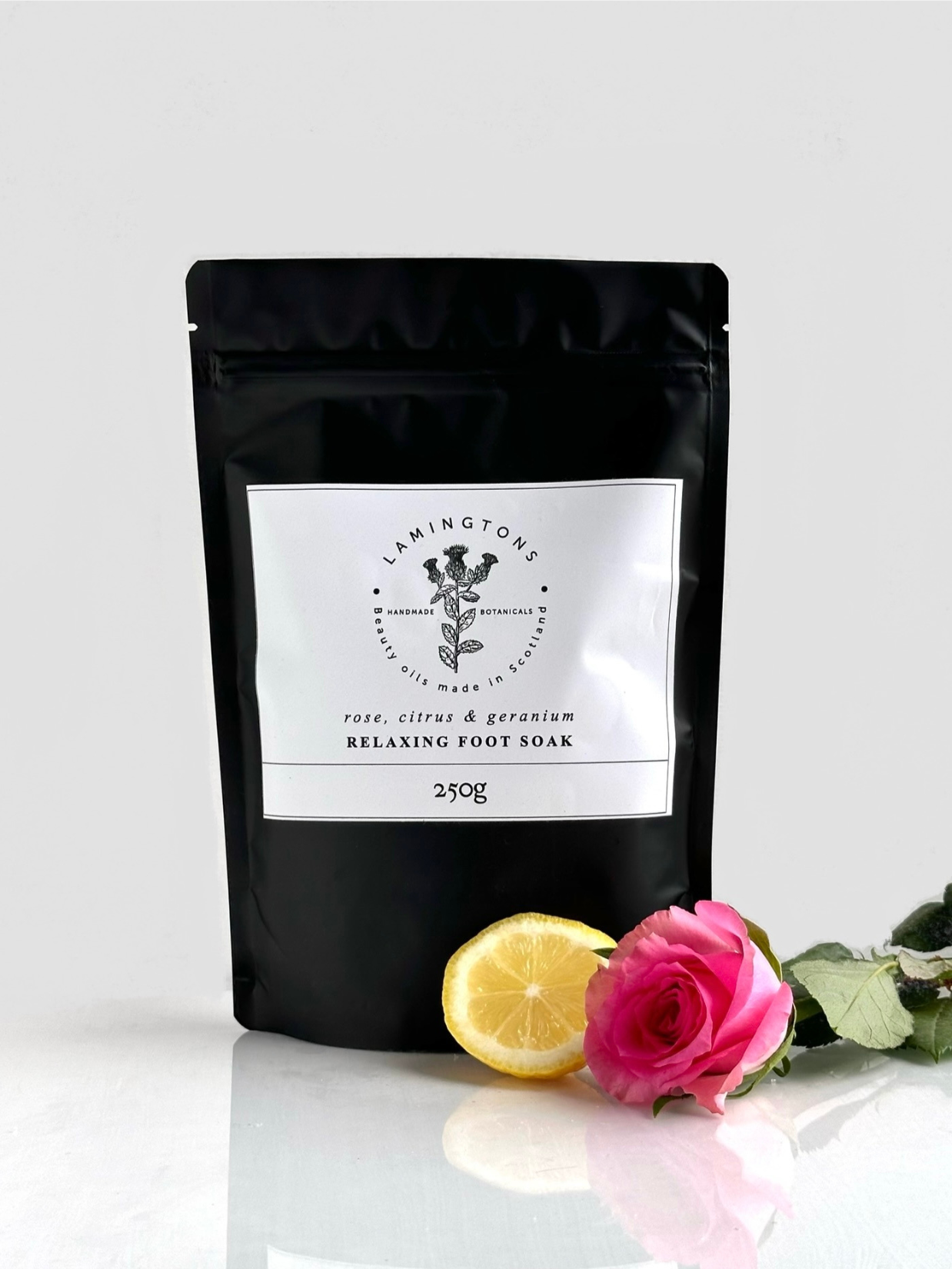 A bag of rose, citrus and geranium relaxing foot soak.