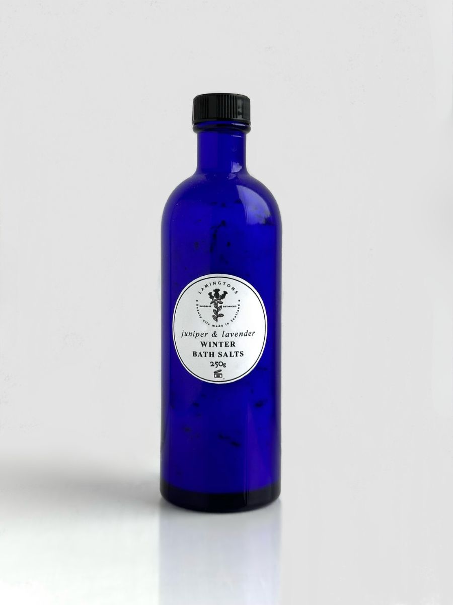 A bottle of juniper and lavender winter bath salts.